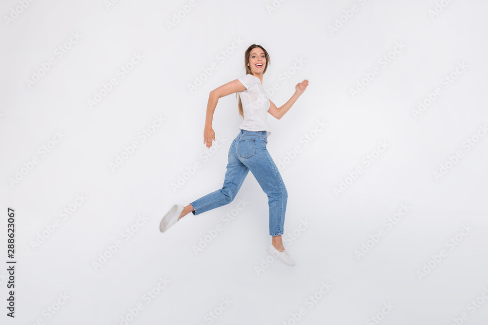 Photo of charming cute glad positive girlfriend going towards her goal ahead forward while isolated with white background Photo of charming cute glad positive girlfriend going towards her goal ahead forward while isolated with white background