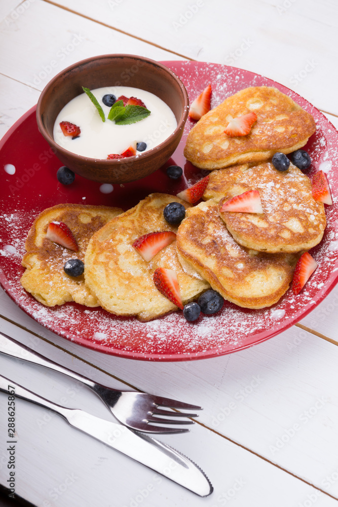 Pancakes with berries and cream Pancakes with berries and cream