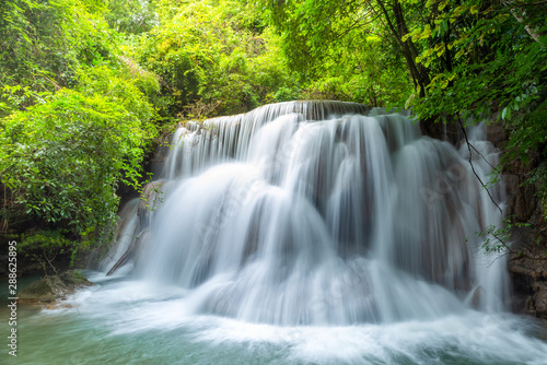Wonderful  tiers of waterfall motion in deep jungle, Located Erawan waterfall Kanchanaburi province, Thailand