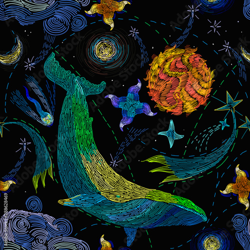 Embroidery, blue whales float in universe among stars. Modern fashion seamless pattern template for clothes, tapestry, t-shirt design. Symbol of imagination, dream, astrology