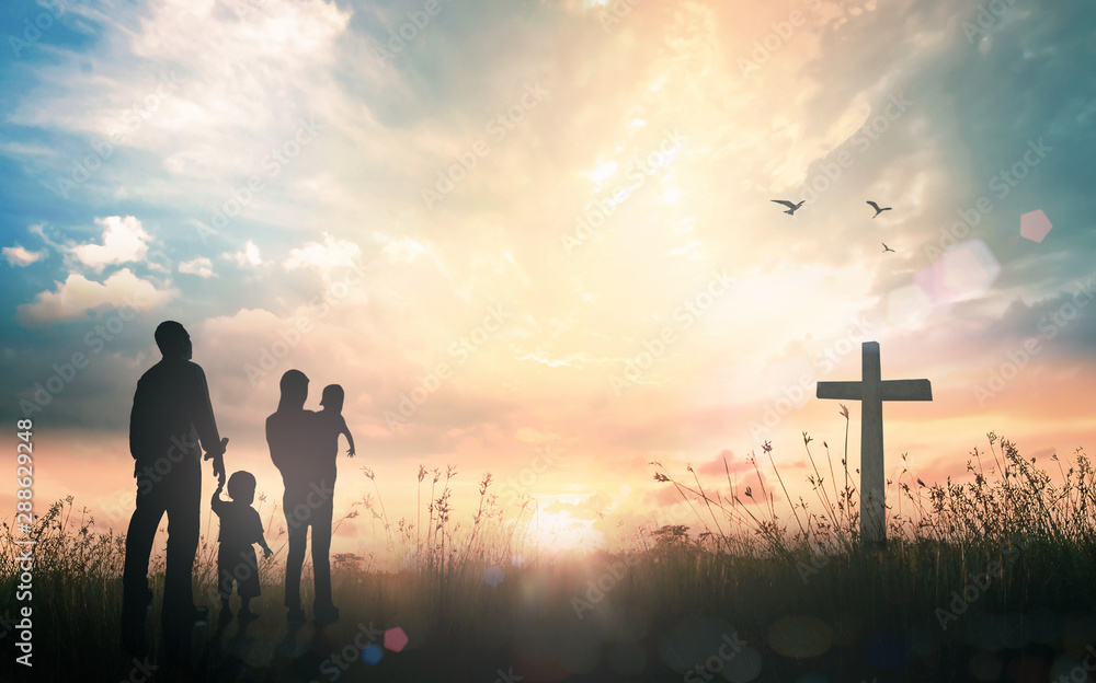 Family worship concept: Silhouette people looking for the cross on autumn sunrise background - obrazy, fototapety, plakaty 