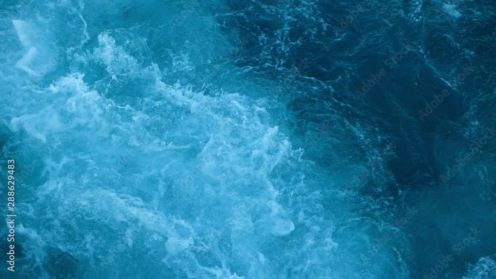 Blue sea water with boat trace. Slow motion. Blue sea water with boat trace. Slow motion.