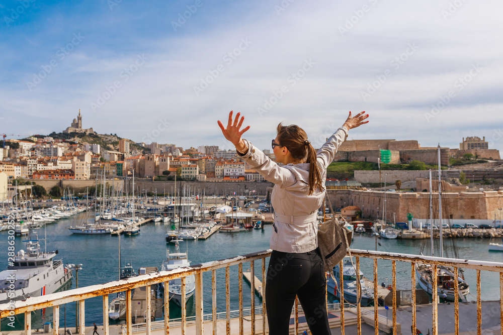 Φωτογραφία Tourist woman in French historical city Marseille and Mediterranean sea coast