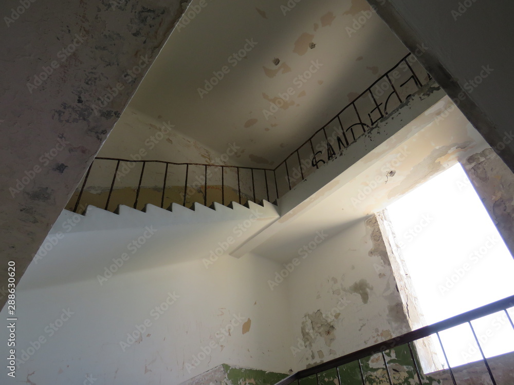 Fototapeta premium spiral staircase in modern building Abandon prison Goli otok croatia