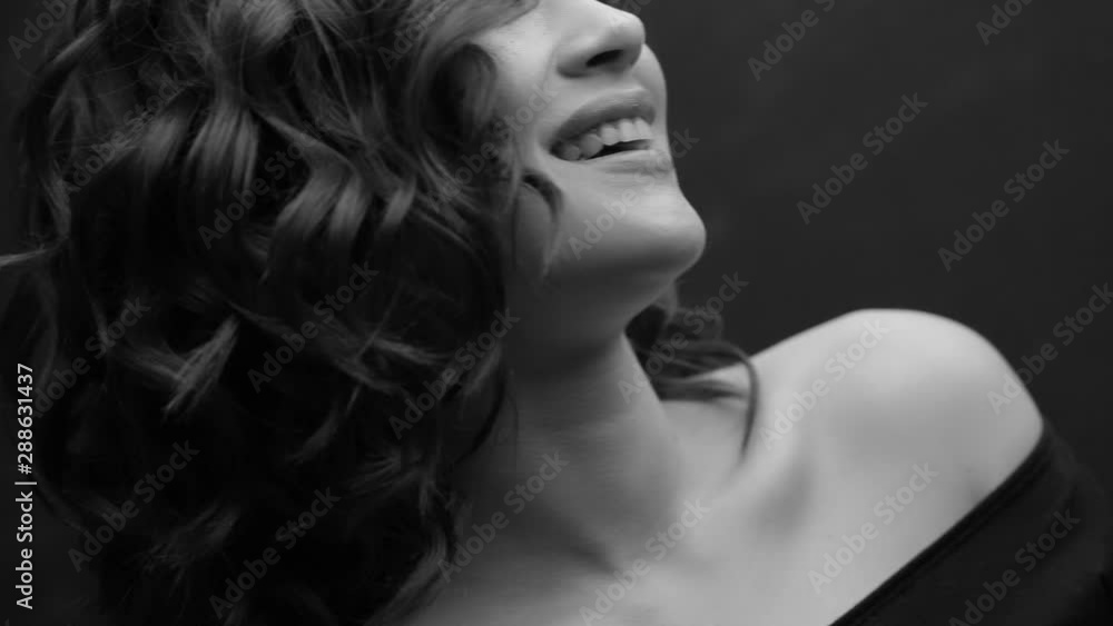 Brunette posing on camera. Black and white video. Emotions girls with a slight flirtation. Brunette posing on camera. Black and white video. Emotions girls with a slight flirtation.