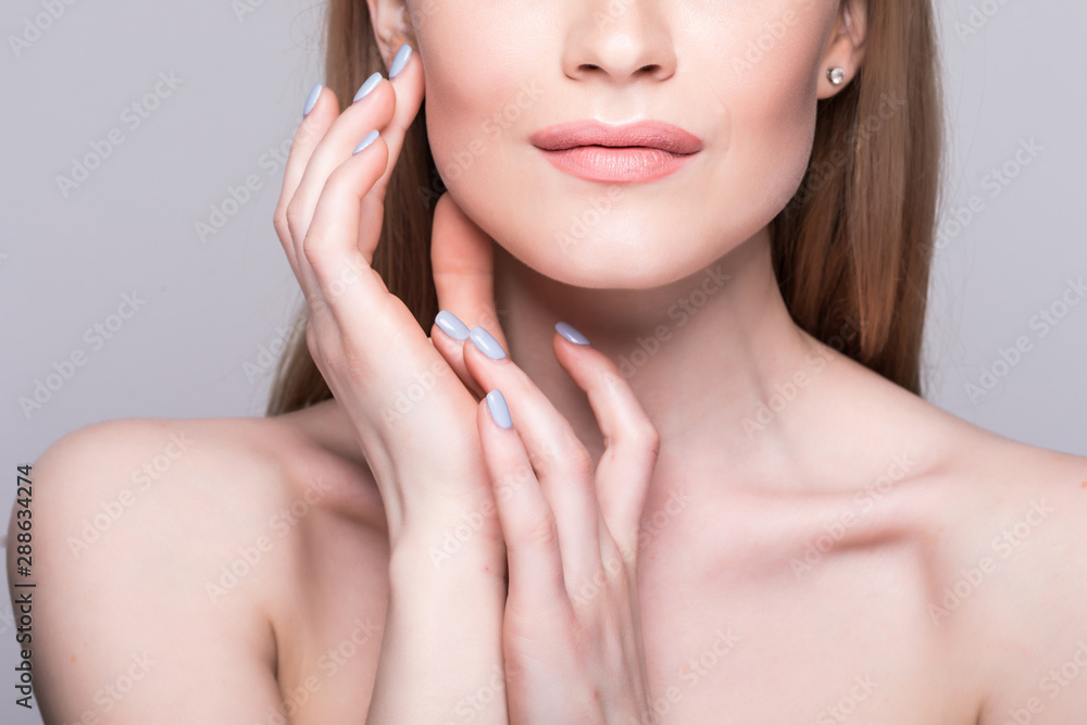 Portrait of young beautiful caucasian woman touching her face isolated over white background. Cleaning face, perfect skin. SPA therapy, skincare, cosmetology, hair removal or plastic surgery concept Portrait of young beautiful caucasian woman touching her face isolated over white background. Cleaning face, perfect skin. SPA therapy, skincare, cosmetology, hair removal or plastic surgery concept
