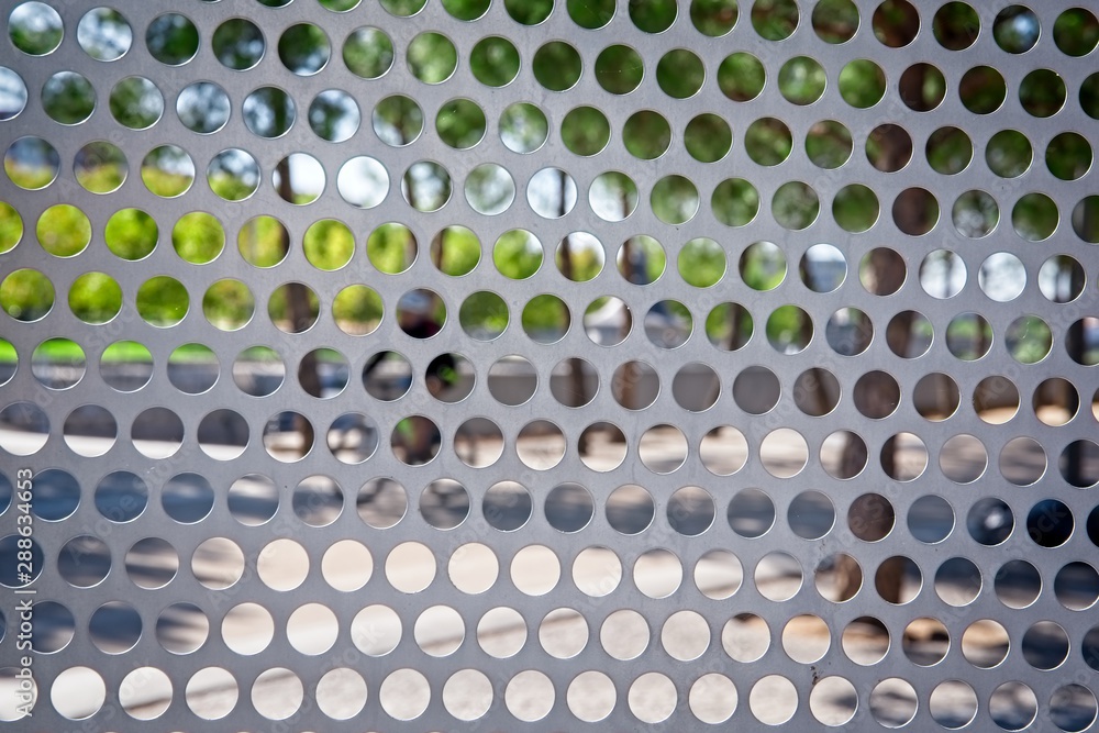 Metal fence with round holes Metal fence with round holes
