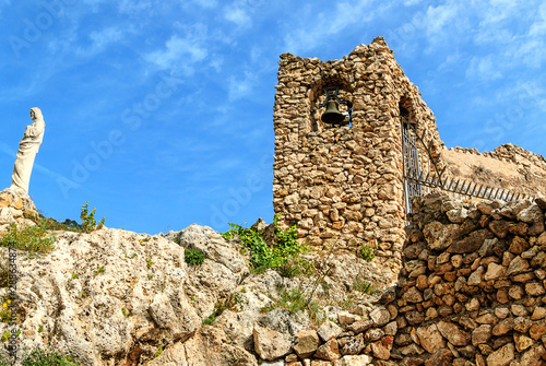 Cave Church (Ruins of Ermita Virgen de la Pena) in Mijas Pueblo, the charming White Village of Costa del Sol, Spain. Mijas is also famous for its burro taxis – touristy carriages pulled by donkeys. 