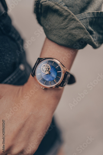 Stylish elegant watch on woman hand