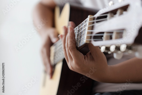 Photography Woman hands playing acoustic classic guitar the musician of jazz and easy listen