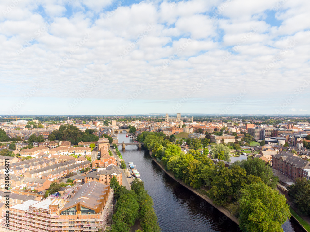 Fototapeta premium Aerial photo of the town of York located in North East England and founded by the ancient Romans, the photo shows the main town centre along the river.