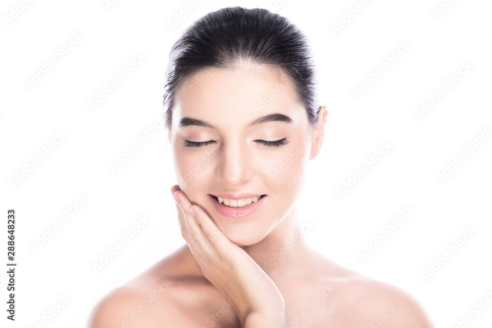 Beauty woman face isolate in white background. Young caucasian girl, perfect skin, cosmetic, spa, beauty treatment concept. One hand touch face, close eye, big smile.