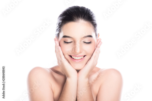 Beauty woman face isolate in white background. Young caucasian girl, perfect skin, cosmetic, spa, beauty treatment concept. Both hands on face, eye close, exciting smile.