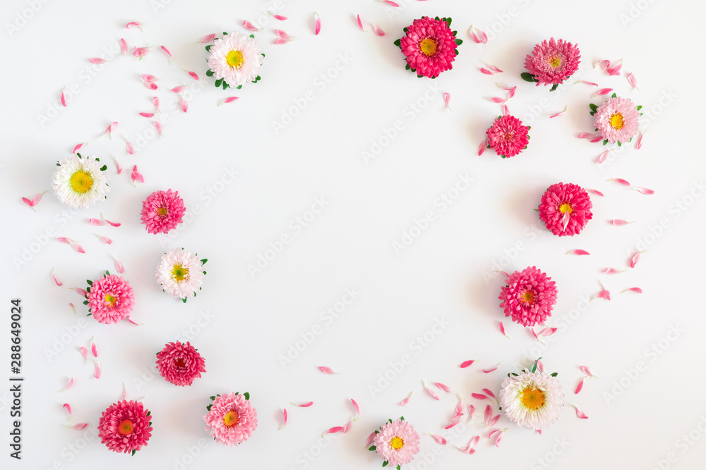 Frame made of pink and white flowers on white background. Valentines Day, Easter, Birthday, Mother's day. Flat lay, top view, copy space Frame made of pink and white flowers on white background. Valentines Day, Easter, Birthday, Mother's day. Flat lay, top view, copy space
