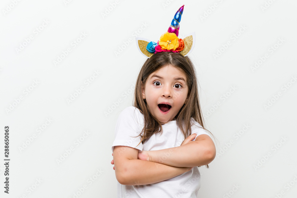 Little caucasian girl with costume and accessories having fun Little caucasian girl with costume and accessories having fun