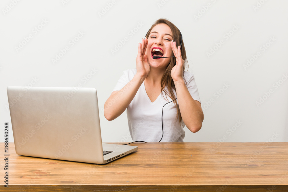 Young telemarketer woman shouting excited to front. Young telemarketer woman shouting excited to front.