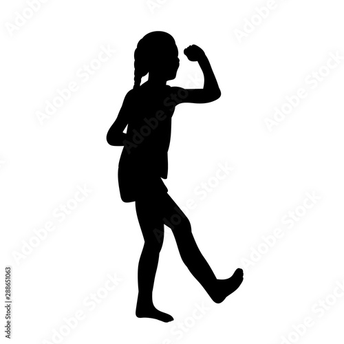 silhouette of a child, a girl stands and rejoices