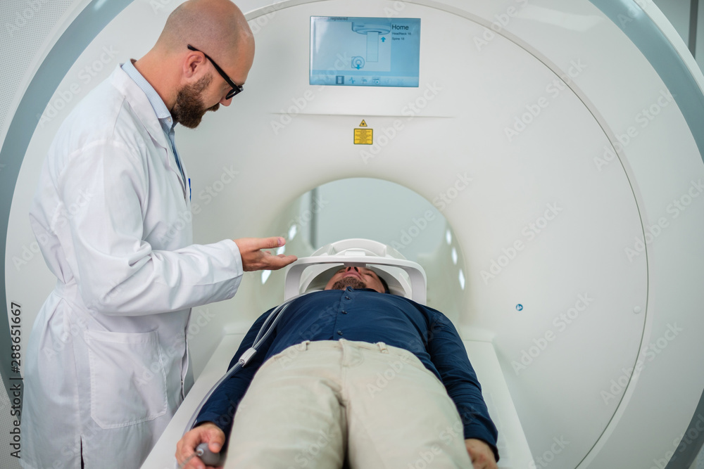 Patient visiting MRI procedure in a hospital Patient visiting MRI procedure in a hospital