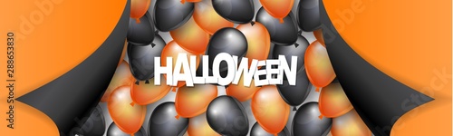 Obraz na płótnie Halloween banner or header design with black and orange balloons and pealing off curved egdes wrapping paper
