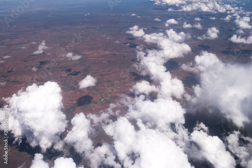 Obraz na plátně Low puffy clouds while flying into La Paz, Bolivia, South America