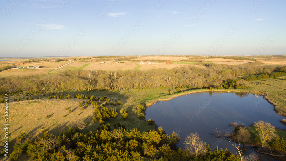 Nebraska rural countryside landscape with pond