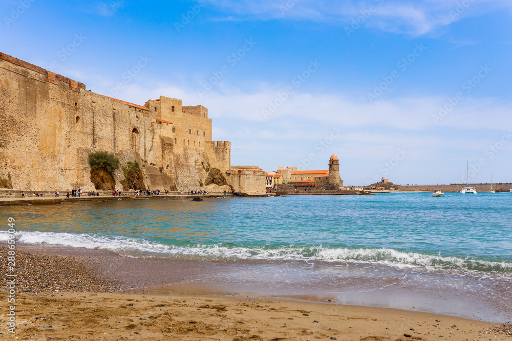 Panorama of Collioure harbour, Languedoc-Roussillon, France, South Europe. Ancient town with old castle on Vermillion coast of French riviera. Famous tourist destination on Mediterranean sea