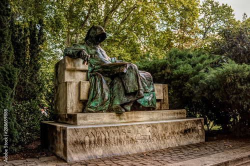 Statue of the mysterious Anonymous in the Varosliget historical park in Budapest, Hungary