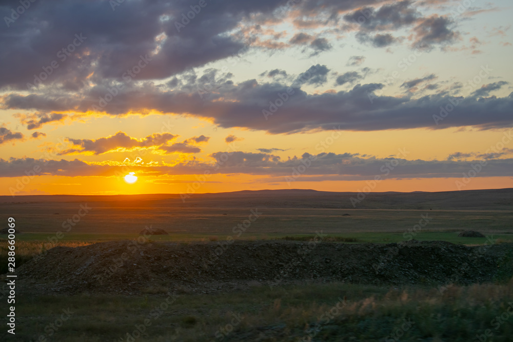 Sunny sunset in the steppes of Kazakhstan. Sunny sunset in the steppes of Kazakhstan.