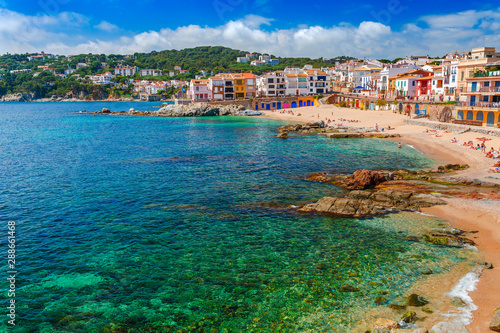 Sea landscape with Calella de Palafrugell, Catalonia, Spain near of Barcelona. Scenic fisherman village with nice sand beach and clear blue water in nice bay. Famous tourist destination in Costa Brava