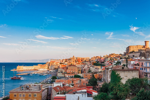 Panoramic sea landscape with Gaeta, Lazio, Italy. Scenic historical town with old buildings, ancient churches, nice sand beach and clear blue water. Famous tourist destination in Riviera de Ulisse