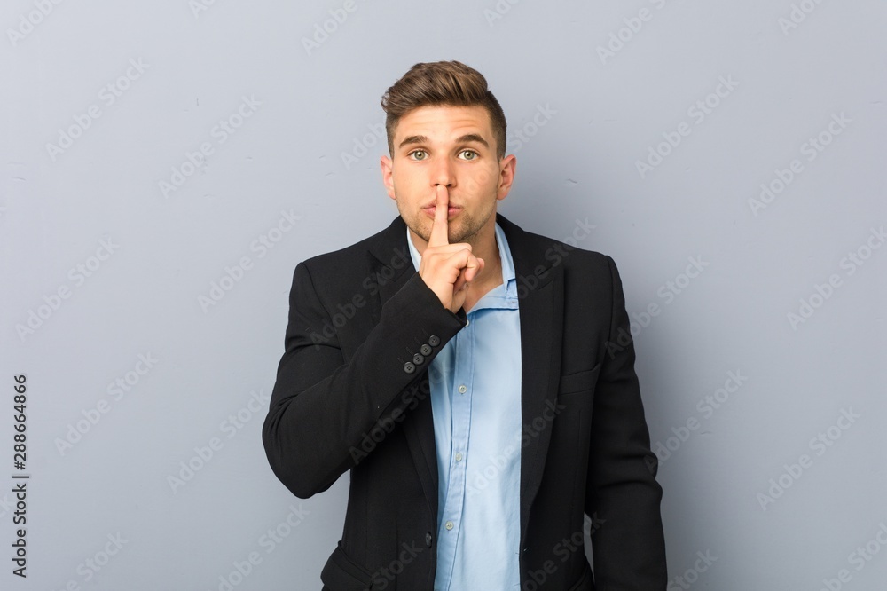 Young handsome caucasian man keeping a secret or asking for silence. Young handsome caucasian man keeping a secret or asking for silence.