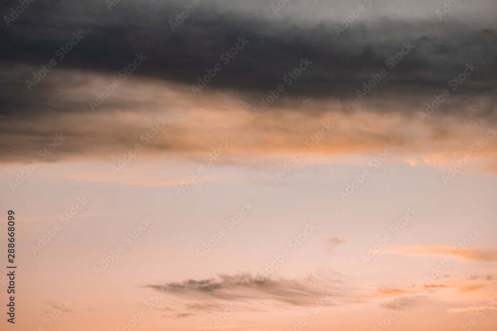 Fototapeta premium Clouded pink sky with copy space background