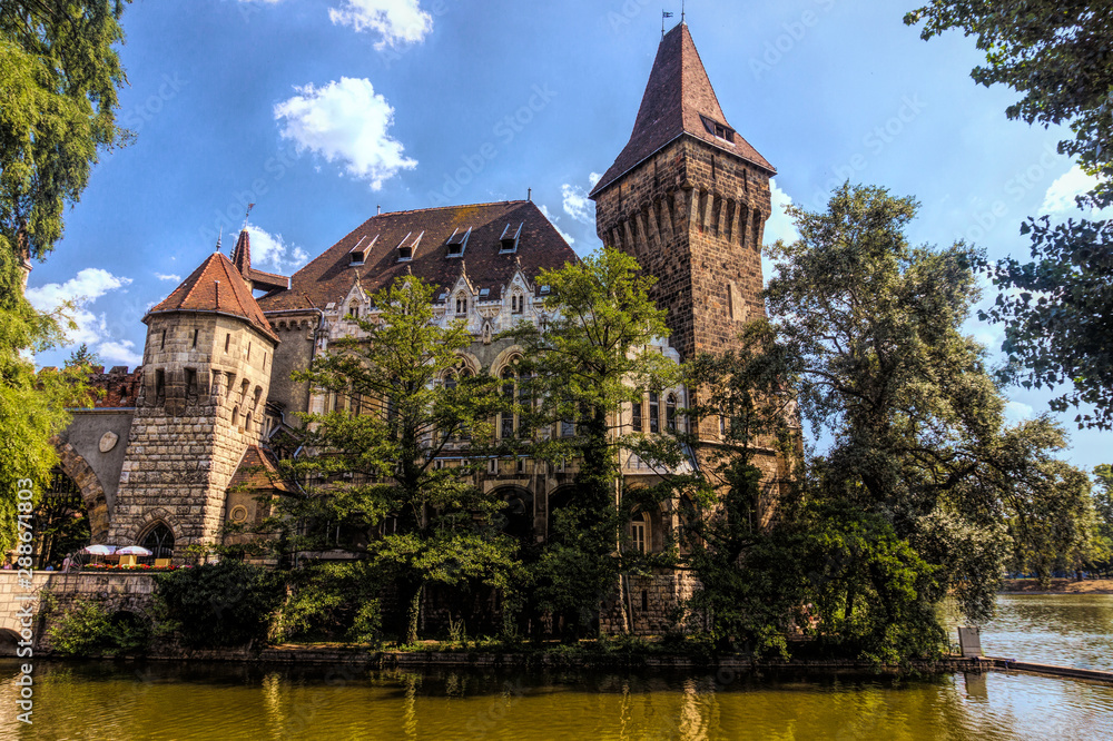 Obraz premium Decorative castle Vajdahunyad in the historical park Varoshliget in Budapest, Hungary. The Millennium of the Hungarian State, 1896