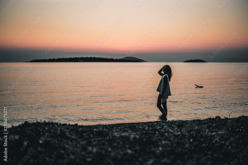 Close up of silhouette woman  at sunset, Greece, Halkidiki 