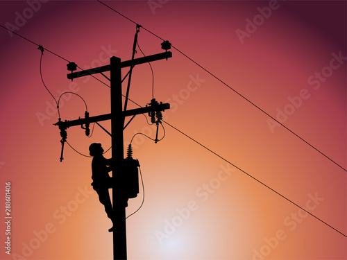 Silhouette of power lineman closing a single phase transformer on energized high-voltage electric power lines.