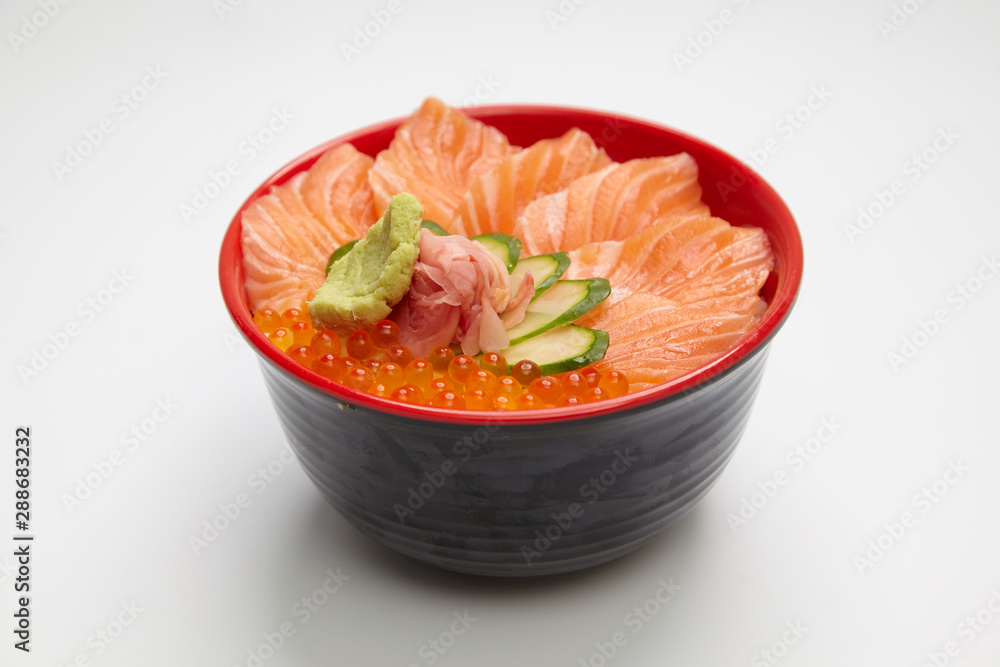 Salmon donburi or slice raw salmon put on cooked rice. Salmon donburi or slice raw salmon put on cooked rice.