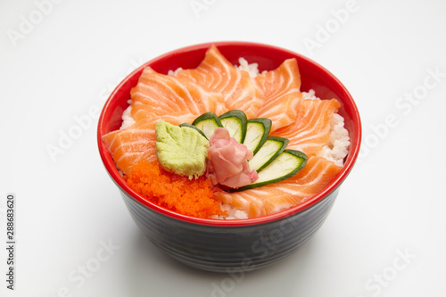 Salmon donburi or slice raw salmon put on cooked rice.