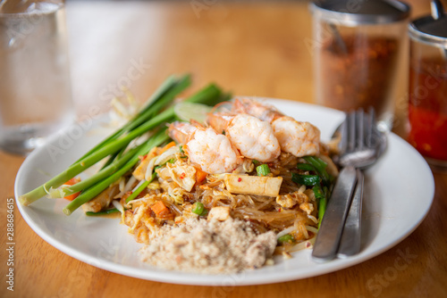 fried noodle or Pad Thai and shrimp, popular menu of Thailand.