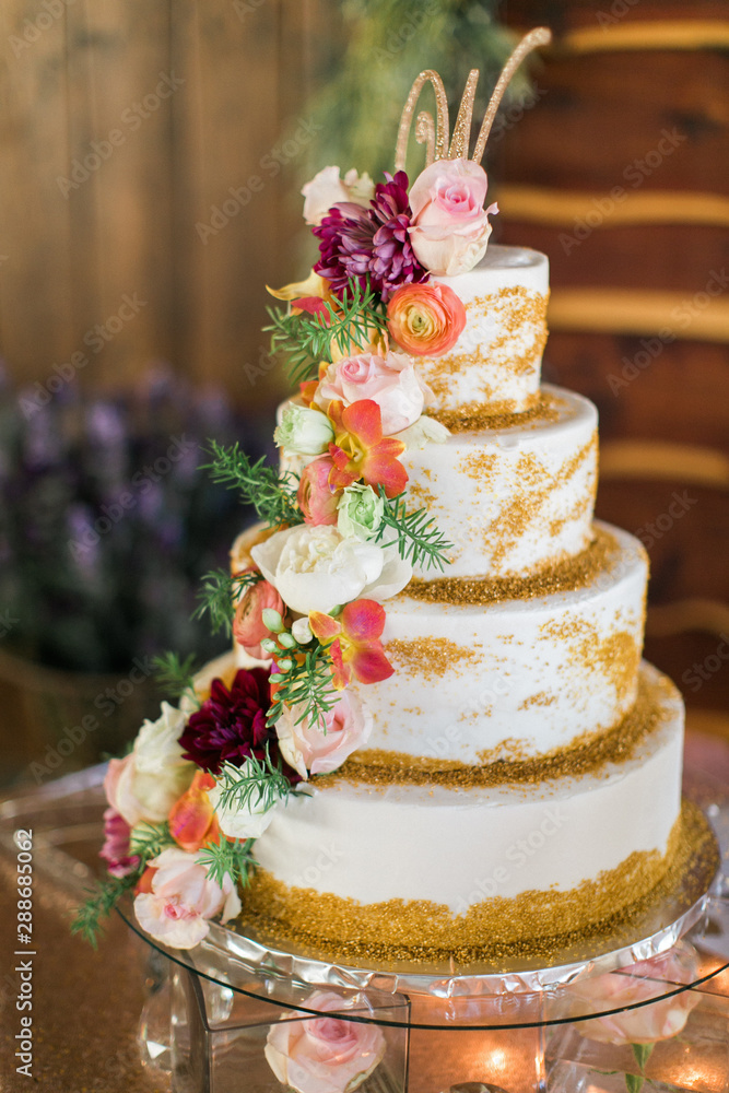 Layered wedding cake with flowers Layered wedding cake with flowers