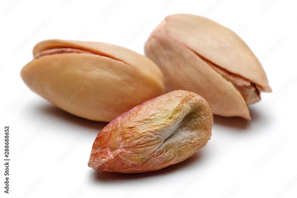 Fresh pistachio nuts isolated on white background Fresh pistachio nuts isolated on white background