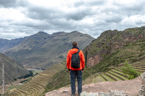 Fototapeta Young male tourist traveling alone in Sacred valley