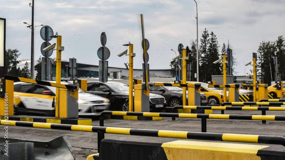 exit of cars from paid Parking at the airport, time lapse exit of cars from paid Parking at the airport, time lapse