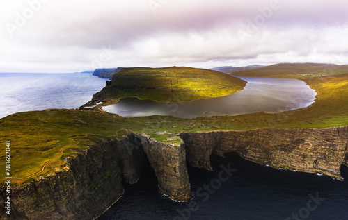 Leitisvatn lake aerial photo and green mountains of Vagar island. Faroe Islands, Denmark.    photo