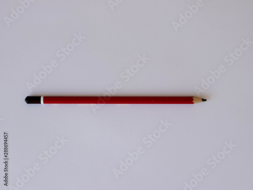 Red, black and white pencil