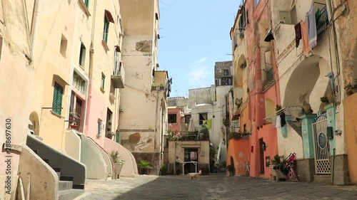 Village of Procida, Mediterranean Sea, near Naples. Characteristic Mediterranean-style courtyard with colorful houses. 