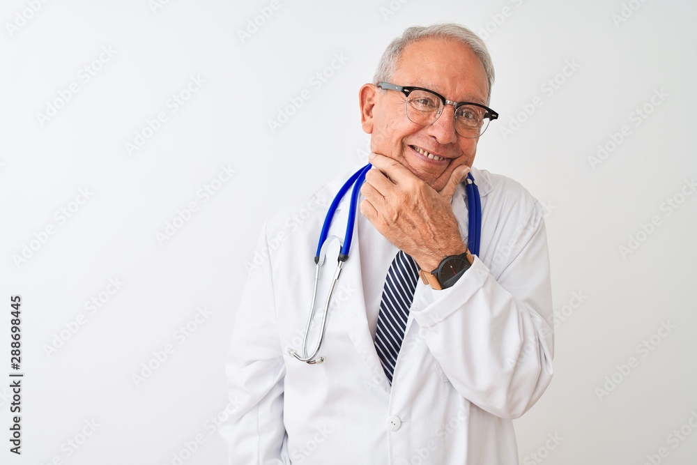 Senior grey-haired doctor man wearing stethoscope standing over isolated white background looking confident at the camera with smile with crossed arms and hand raised on chin. Thinking positive. Senior grey-haired doctor man wearing stethoscope standing over isolated white background looking confident at the camera with smile with crossed arms and hand raised on chin. Thinking positive.