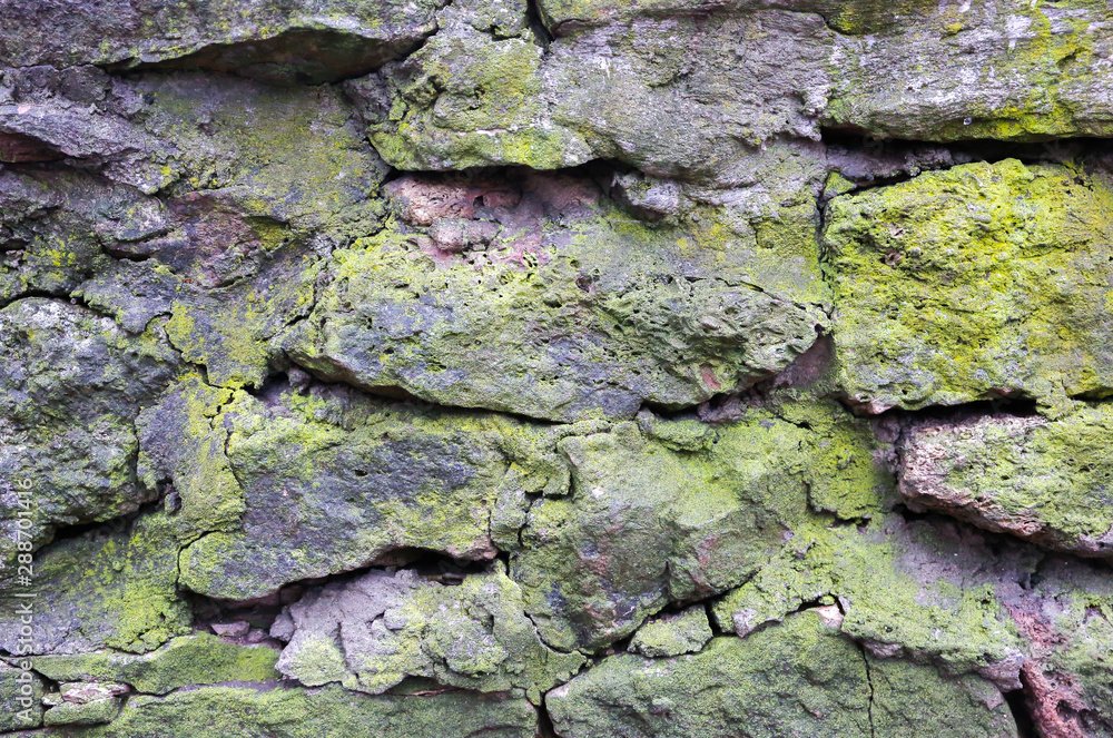 Old stones with moss texture background. Old stones with moss texture background.