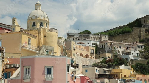 Village of Marina Corricella, Procida Island, Mediterranean Sea, near Naples. Church and the characteristic houses with colored facades.