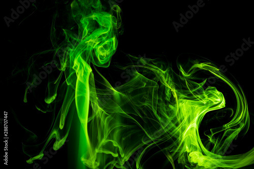 Green smoke on black background