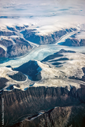Western coast of Greenland, aerial view of glacier,  mountains and ocean © Delphotostock